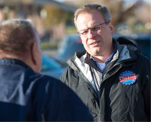 Rick Egan  |  The Salt Lake Tribune

Congressional candidate Doug Owens talks to Larry Kern as he campaigns in a shopping center in West Jordan, Monday, November 3, 2014