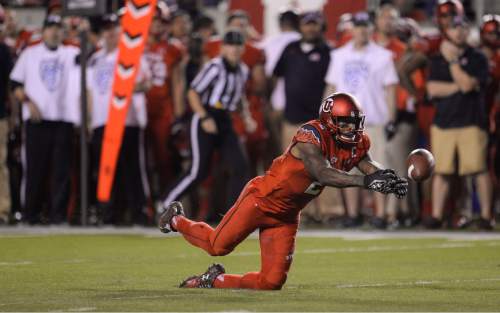 Francisco Kjolseth | The Salt Lake Tribune
Utah Utes wide receiver Kenneth Scott (2) has a pass slip away while battling the Michigan Wolverines at Rice Eccles Stadium on Thursday, Sept. 3, 2015.