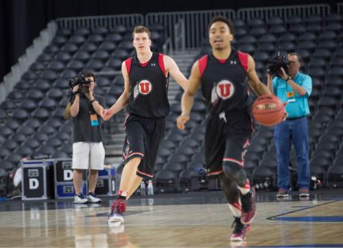 Steve Griffin  |  The Salt Lake Tribune

Utah Utes forward Jakob Poeltl (42) and Utah Utes guard Brandon Taylor (11) run the court during practice on the NRG Stadium court prior to their 2015 NCAA Men's Basketball Championship Regional Semifinal game against Duke in Houston, Thursday, March 26, 2015.