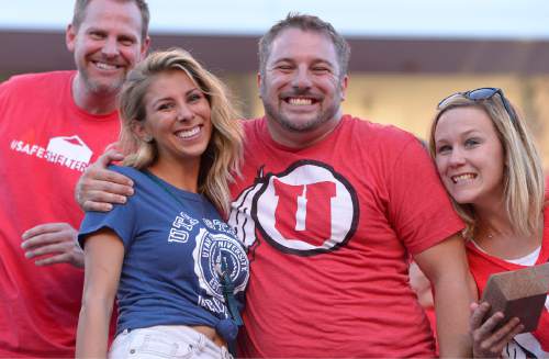 Leah Hogsten  |  The Salt Lake Tribune
Utes and Aggies fans. University of Utah hosts Utah State at Rice-Eccles Stadium, Friday, September 11, 2015.