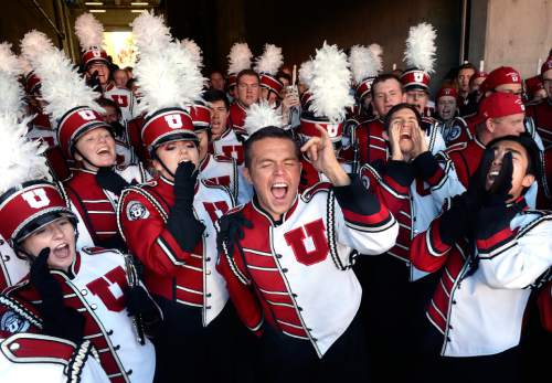 Scott Sommerdorf   |  The Salt Lake Tribune
The Utah marching band chants it's traditional U-T-A-H chant prior to the Utah State / Utah football game at Rice-Eccles, Friday, September 11, 2015.