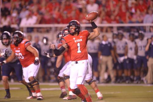 Leah Hogsten  |  The Salt Lake Tribune
Utah Utes quarterback Kendal Thompson (1) runs out of the pocket. University of Utah is tied with Utah State 14-14 at halftime at Rice-Eccles Stadium, Friday, September 11, 2015.