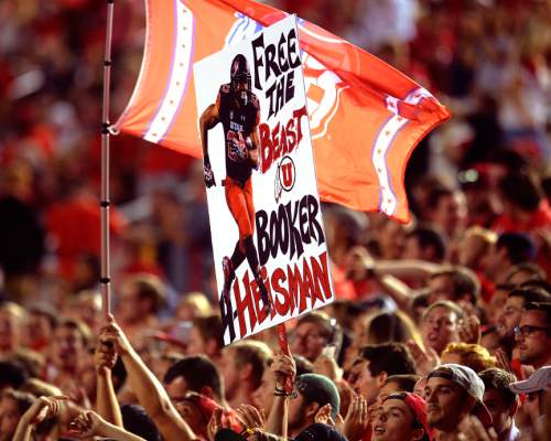 Leah Hogsten  |  The Salt Lake Tribune
Utah Utes running back Devontae Booker (23) has fans in the crowd. University of Utah is tied with Utah State 14-14 at halftime at Rice-Eccles Stadium, Friday, September 11, 2015.