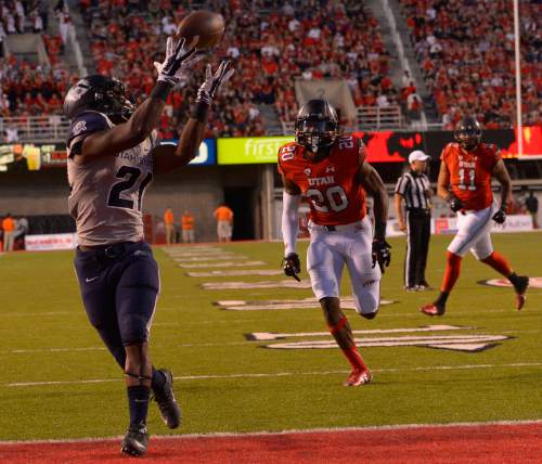 Leah Hogsten  |  The Salt Lake Tribune
Utah State Aggies running back LaJuan Hunt (21) makes a touchdown. University of Utah is tied with Utah State 14-14 at halftime at Rice-Eccles Stadium, Friday, September 11, 2015.