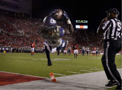 Scott Sommerdorf   |  The Salt Lake Tribune
USU WR Devonte Robinson comes down with this desperation pass from QB Chuckie Keeton, but he came down out of bounds as USU tried to catch up late ion the game. Utah beat Utah State 24-14 at Rice-Eccles, Friday, September 11, 2015.
