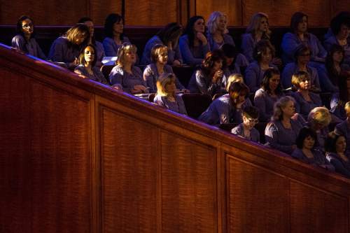 Chris Detrick  |  The Salt Lake Tribune
Members of the Mormon Tabernacle Choir listen as Linda K. Burton, Relief Society general president, speaks  during the 185th Annual LDS General Conference Saturday April 4, 2015.