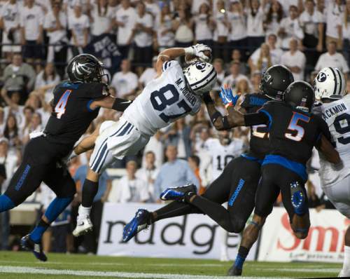 Rick Egan  |  The Salt Lake Tribune

Brigham Young Cougars wide receiver Mitchell Juergens (87) hauls in the game winning touchdown, on a hail-mary play, with 45 seconds left in the game,  in college football action, BYU vs. Boise State at Lavell Edwards Stadium, Saturday, September 12, 2015.