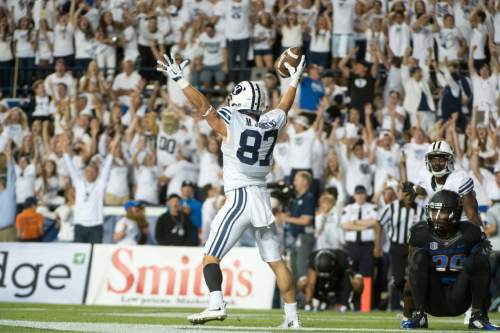 Rick Egan  |  The Salt Lake Tribune

Brigham Young Cougars wide receiver Mitchell Juergens (87) celebrates after catching the game winning touchdown, on a hail-mary play, with 45 seconds left in the game,  in college football action, BYU vs. Boise State at Lavell Edwards Stadium, Saturday, September 12, 2015.