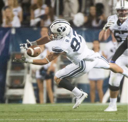 Rick Egan  |  The Salt Lake Tribune

Brigham Young Cougars wide receiver Mitchell Juergens (87) can't quite hold onto a pass, in college football action, BYU vs. Boise State at Lavell Edwards Stadium, Saturday, Sept. 12, 2015.
