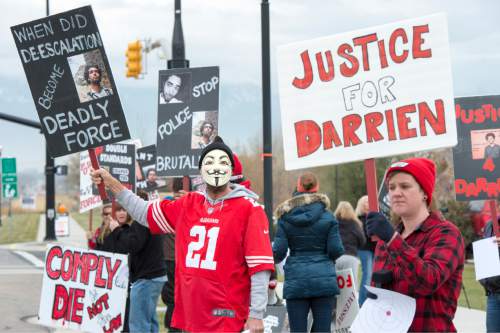 Rick Egan  |  The Salt Lake Tribune

Supporters chant during a rally fin Saratoga Springs, for Darrien Hunt, who was fatally shot by two Saratoga Springs police officers on Sept. 10, 2014, after allegedly swinging a samurai-type sword at the officers.Friday, November 14, 2014