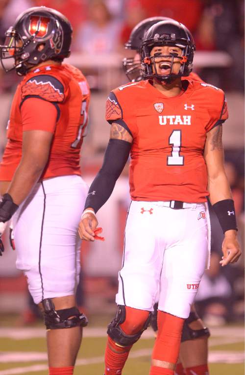 Leah Hogsten  |  The Salt Lake Tribune
Utah Utes quarterback Kendal Thompson (1) replaces an injured Travis Wilson. University of Utah is tied with Utah State 14-14 at halftime at Rice-Eccles Stadium, Friday, September 11, 2015.