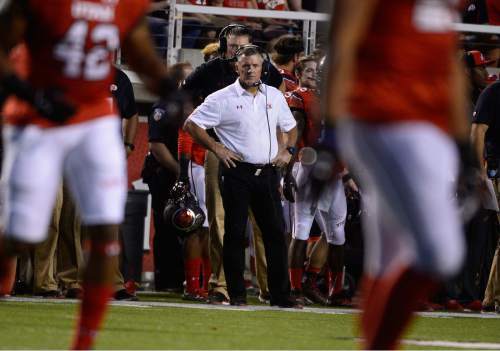 Scott Sommerdorf   |  The Salt Lake Tribune
Utah Utes head coach Kyle Whittingham watches the action during first half play. Utah and Utah State were tied 14-14 at the half at Rice-Eccles, Friday, September 11, 2015.