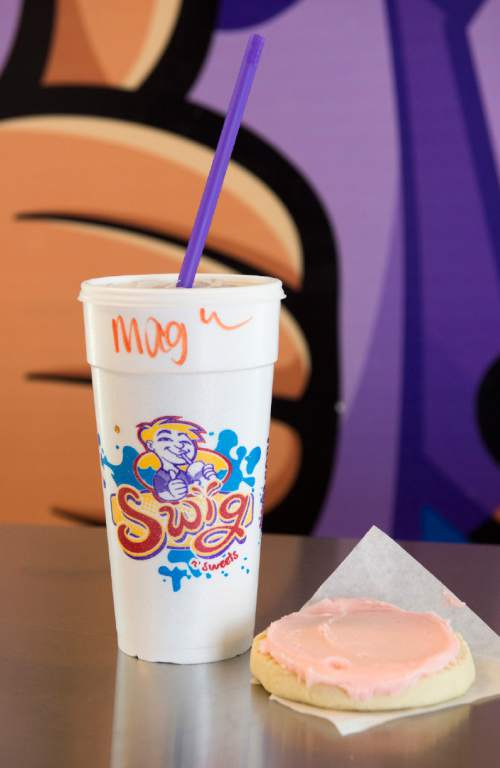 Rick Egan  |  The Salt Lake Tribune

A pink cookie and a soda at Swig in Lehi, Monday, July 30, 2015.