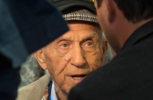 Steve Griffin  |  The Salt Lake Tribune

World War ll veteran Max Burdick, of Salt Lake City, talks to the media following a morning briefing at the Utah State Senate Building, prior to the departure of a Utah Honor Flight from Salt Lake City, Thursday, September 17, 2015. The flight shuttled World War ll and Korean War Veterans to Washington, D.C,. where they will be given the opportunity to view memorials erected in memory of their service. Burdick, 92, was aboard the USS St. Louis during the Pearl Harbor invasion on Dec. 7, 1941.  The Utah House of Representatives raised $35,000 to sponsor the flight so the veterans could participate free of cost.
