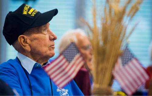 Steve Griffin  |  The Salt Lake Tribune

World War ll veteran Reed Holdaway, of Salt Lake City, listens to instructions during a morning briefing at the Utah State Senate Building, prior to departure of a Utah Honor Flight from Salt Lake City, Thursday, September 17, 2015. The flight shuttled World War ll and Korean War Veterans to Washington, D.C,. where they will be given the opportunity to view memorials erected in memory of their service.  The Utah House of Representatives raised $35,000 to sponsor the flight so the veterans could participate free of cost.