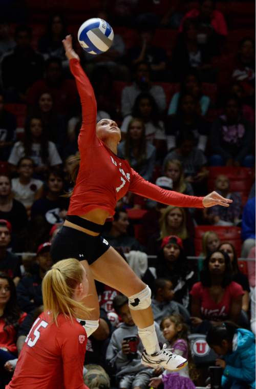 Francisco Kjolseth | The Salt Lake Tribune
Utah's Eliza Katoa reaches high for a shot as they host No. 9 BYU in the annual meeting between the schools' women's volleyball teams.
