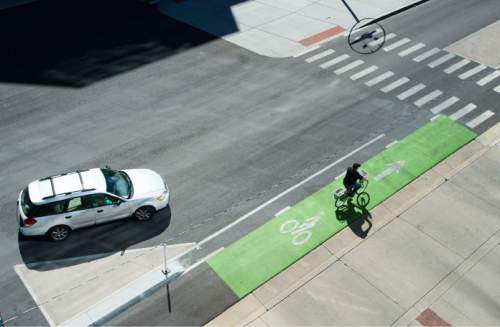 Steve Griffin  |  The Salt Lake Tribune

A bike pedals along in the new bike lanes on 300 South near State Street in Salt Lake City, Friday, September 18, 2015.