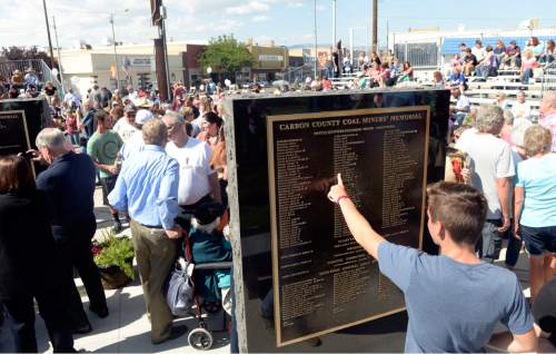 Al Hartmann  |  The Salt Lake Tribune
The Carbon County Coal Miners' Memorial was unveiled and dedicated Monday September 7 to coal miners that  died in accidents since the inception of mining in the 1880's.  Two statues and several large plaques with 1,400 names of miners now resides in the Price Peace Park along Main Street.