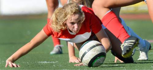 Steve Griffin  |  The Salt Lake Tribune

East's Emma Workman watches the ball after getting knocked down by a Woods Cross defender during girl's soccer game at Woods Cross High School in Woods Cross, Utah Tuesday, September 22, 2015.