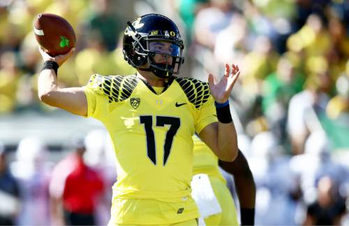 Oregon quarterback Jeff Lockie (17) throws the football during the first quarter of an NCAA college football game against Georgia State, Saturday, Sept. 19, 2015, in Eugene, Ore. (AP Photo/Ryan Kang)