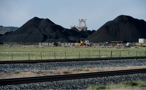 Francisco Kjolseth  |  Tribune file photo

Coal trucked from central Utah piles up at the Levan transfer station south of Nephi where it is loaded on Union Pacific freight cars bound for California.