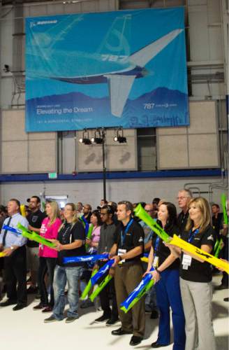Steve Griffin  |  The Salt Lake Tribune

Employees cheer the completion of the first all Utah built 787-9 horizontal stabilizer (tail) during an event at the Boeing Fabrication Salt Lake facility Friday, September 25, 2015.