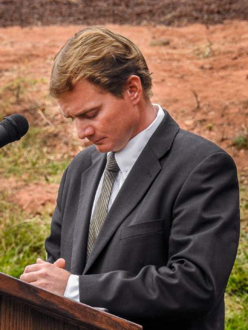 Trent Nelson  |  The Salt Lake Tribune
Joseph Jessop speaks at a memorial for the victims of a Sept. 14 flash flood. Jessop lost two wives and seven children. Thirteen died and one is still missing. The memorial was held in Maxwell Park in Hildale, Saturday September 26, 2015.