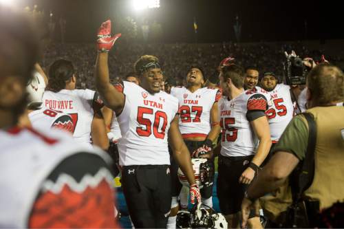 Rick Egan  |  The Salt Lake Tribune

The Utes celebrate their 30-28 upset over UCLA, in Pac 12 action, at the Rose Bowl, Saturday, October 4, 2014