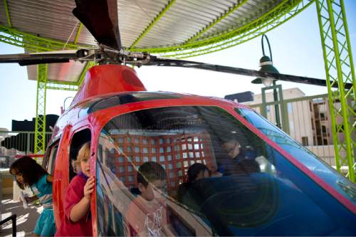 Lennie Mahler  |  The Salt Lake Tribune

Children play in the IHC Life Flight helicopter at Discovery Gateway Children's Museum on Friday, Sept. 25, 2015.
