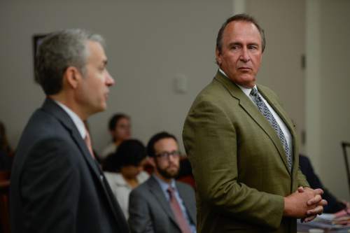 Francisco Kjolseth | The Salt Lake Tribune
Assistant U.S. Attorney from Denver, Timothy Jafek speaks with the judge as former Utah Attorney General Mark Shurtleff, right, facing public corruption charges, appears in Judge Elizabeth Hruby-Mills courtroom in Salt Lake City on Monday, Sept. 28, 2015, for a pre-trial hearing.