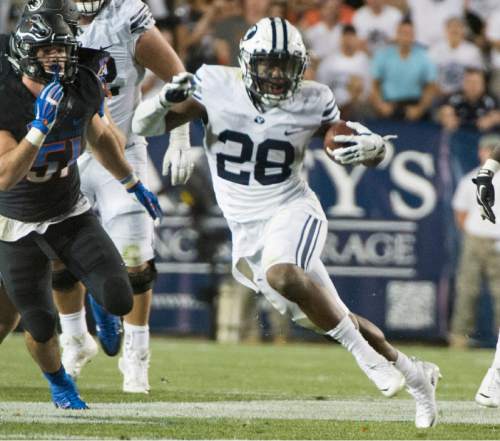 Rick Egan  |  The Salt Lake Tribune

Brigham Young running back Adam Hine (28) runs the ball for the Cougars (28) in college football action, BYU vs. Boise State at Lavell Edwards Stadium, Saturday, September 12, 2015.