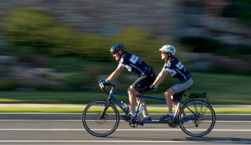 Rick Egan  |  The Salt Lake Tribune

Steve and Becky Andrews take an afternoon ride on their tandem bike through the hills of North Salt Lake, Thursday, July 30, 2015.
