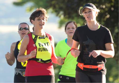 Rick Egan  |  The Salt Lake Tribune

Becky Andrews on an early morning run with her running friends Alanna Whetsel, Brenda Petersen and Suzette Hirst. Thursday, July 30, 2015.