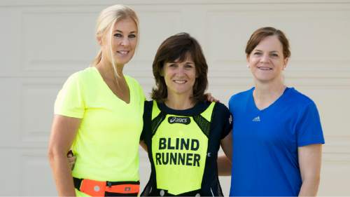 Rick Egan  |  The Salt Lake Tribune

L-R Suzette Hirst, Becky Andrews, and Brenda Petersen.  Hirst and Peterson ran as Becky's guide in the Boston Marathon, and take turns guiding her, nearly everyday, as they run in their Bountiful neighborhood. Friday, July 31, 2015.
