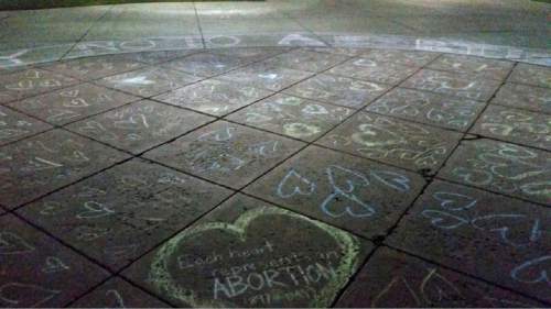 Courtesy  |  Kristina Hernandez, Students for Life

Utah State University students were told to scrub a pro-life chalk drawing last week after police said their work amounted to vandalism. The university is now clarifying its policies to make sure rules regulating signs and graffiti don't threaten student speech.