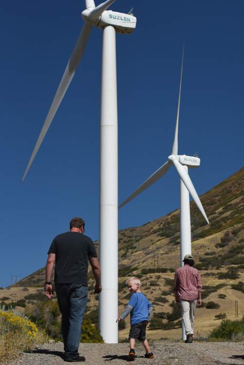 Francisco Kjolseth | The Salt Lake Tribune
Rocky Mountain Power hosts a tours to tout its Blue Sky clean energy program with a bus trip to the wind farm at the base of Spanish Fork canyon. Rocky Mountain Power contracts to buy the power from the station with nine wind mills, which at capacity generates 18.9 megawatts an hour.