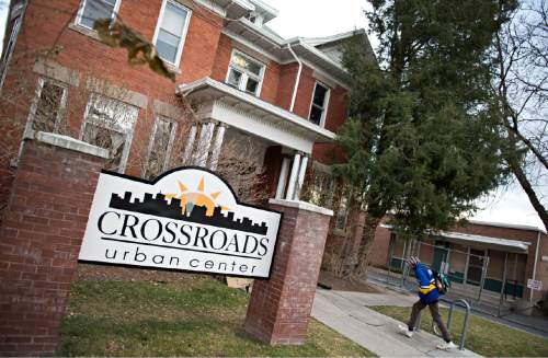 Lennie Mahler  |  The Salt Lake Tribune
A man enters Crossroads Urban Center on Thursday, Dec. 11, 2014. The center provides resources such as food and clothing to low-income Utahns.