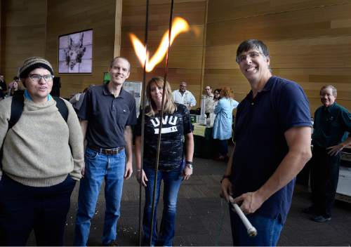 Scott Sommerdorf   |  The Salt Lake Tribune
Professor Kevin Shurtleff, right shows off his "Jacob's Ladder" exhibit during the College of Science & Health Dean Day. There were interactive exhibits, giveaways to show students what the College of Science & Health has to offer at UVU, October 26, 2015.