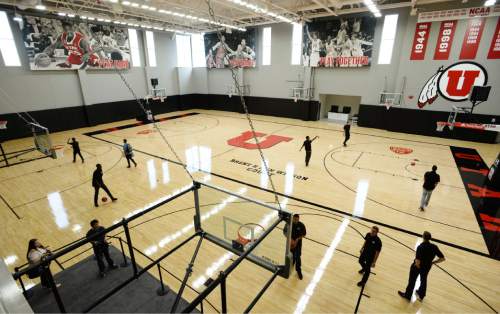 Steve Griffin  |  The Salt Lake Tribune

The Unviersity of Utah men's basketball team shoot some hoops as guests get the first look at the new Jon M. and Karen Huntsman Basketball Center during grand opening ceremony on the University of Utah campus in Salt Lake City, Thursday, October 1, 2015.