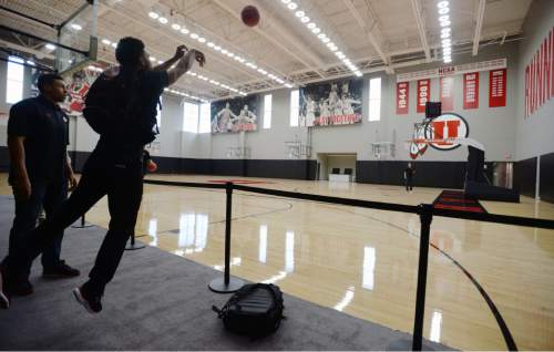 Steve Griffin  |  The Salt Lake Tribune

University of Utah basketball player Isaiah Wright fires a long range jumper from off the court as guests get the first look at the new Jon M. and Karen Huntsman Basketball Center during grand opening ceremony on the University of Utah campus in Salt Lake City, Thursday, October 1, 2015.