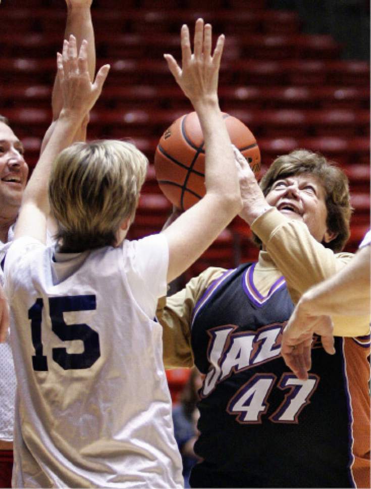 Tribune file photo
Utah Governor Olene Walker has her shot blocked by State Representative Julie Fisher of District 17 during a game at the Huntsman Center in 2004.