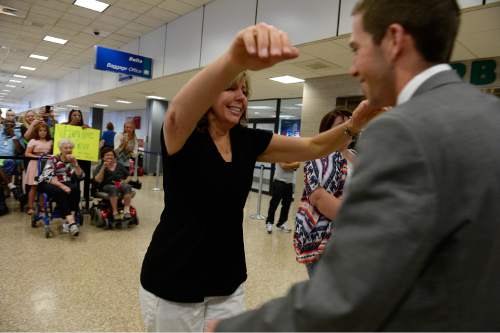 Scott Sommerdorf   |  The Salt Lake Tribune
Sheri Randolph rushes in to hug her son Tyler who has just returned from his mission to Peru at the Salt Lake International Airport, Wednesday, September 9, 2015.