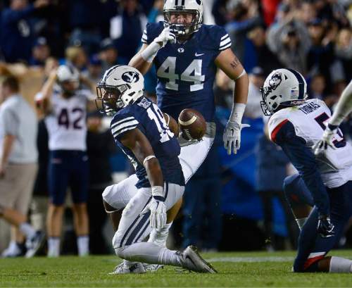 Scott Sommerdorf   |  The Salt Lake Tribune
BYU defensive back Michael Shelton (18) comes up after intercepting a pass to help seal the BYU win during second half play. BYU beat UCONN 30-13, Friday, October 2, 2015.