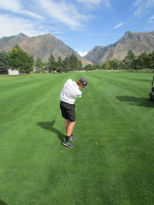 Tom Wharton  |  The Salt Lake Tribune

Lone Peak golfer Carson Lundell practices for state tournament at Alpine Country Club.