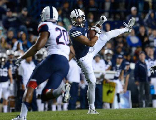 Scott Sommerdorf   |  The Salt Lake Tribune
BYU wide receiver Terenn Houk (11) turns to run after gathering in a pass late in the first half. UCONN and BYU were tied 7-7 at the half, October 2, 2015.