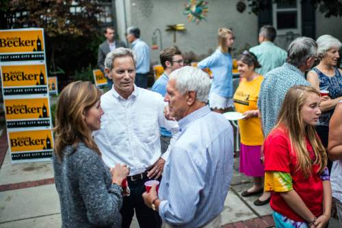 Chris Detrick  |  Tribune file photo
Salt Lake City Mayor Ralph Becker talks to Kim Wirthlin and Dave Jones at his home in Salt Lake City Tuesday August 11, 2015.