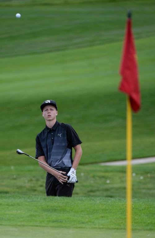 Francisco Kjolseth | The Salt Lake Tribune
Connor Howe of Weber keeps an eye on his ball as he competes in the boys class 5A golf tournament played on the Gold Course at Soldier Hollow in Midway on Tuesday, Oct. 6, 2015.