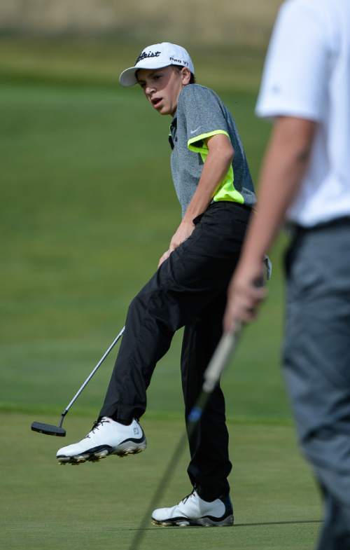 Francisco Kjolseth | The Salt Lake Tribune
Cole Ponich reacts after just missing a put while competing in the boys class 5A golf tournament played on the Gold Course at Soldier Hollow in Midway on Tuesday, Oct. 6, 2015.
