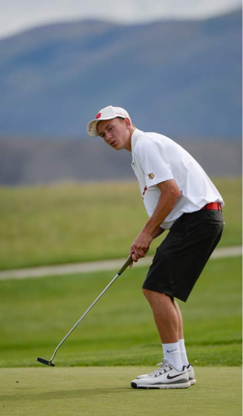 Francisco Kjolseth | The Salt Lake Tribune
Hayden Banz of East reacts to a close shot as he competes in the boys class 4A golf tournament played on the Silver Course at Soldier Hollow in Midway on Tuesday, Oct. 6, 2015.