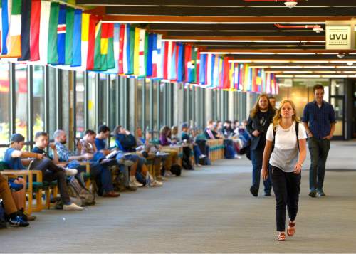 Leah Hogsten  |  The Salt Lake Tribune
Karly Osborne heads to her class,  October 7, 2015. About 3,450 more students are on campus at Utahís public colleges and universities this semester, and more than half of them are at Utah Valley University. A newly released snapshot of students, both full-time and part-time, shows a statewide 2 percent bump in enrollment. After staying flat for two years, the uptick is driven by a lower minimum age for missionaries announced in 2012 by The Church of Jesus Christ of Latter-day Saints. Men can now leave at 18, instead of 19; women at 19 instead of 21.